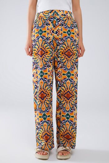 Pantalon multicolore à imprimé fleuri en orange et bleu 2