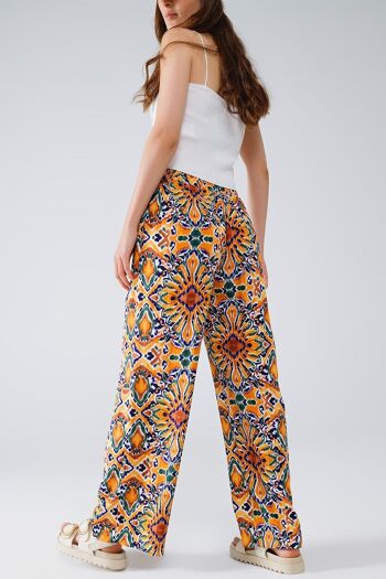 Pantalon multicolore à imprimé fleuri en orange et bleu 3