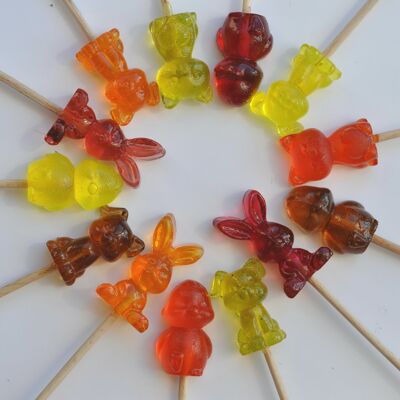 Handmade lollipops in the shape of small animals (dog, cat, rabbit, chick)