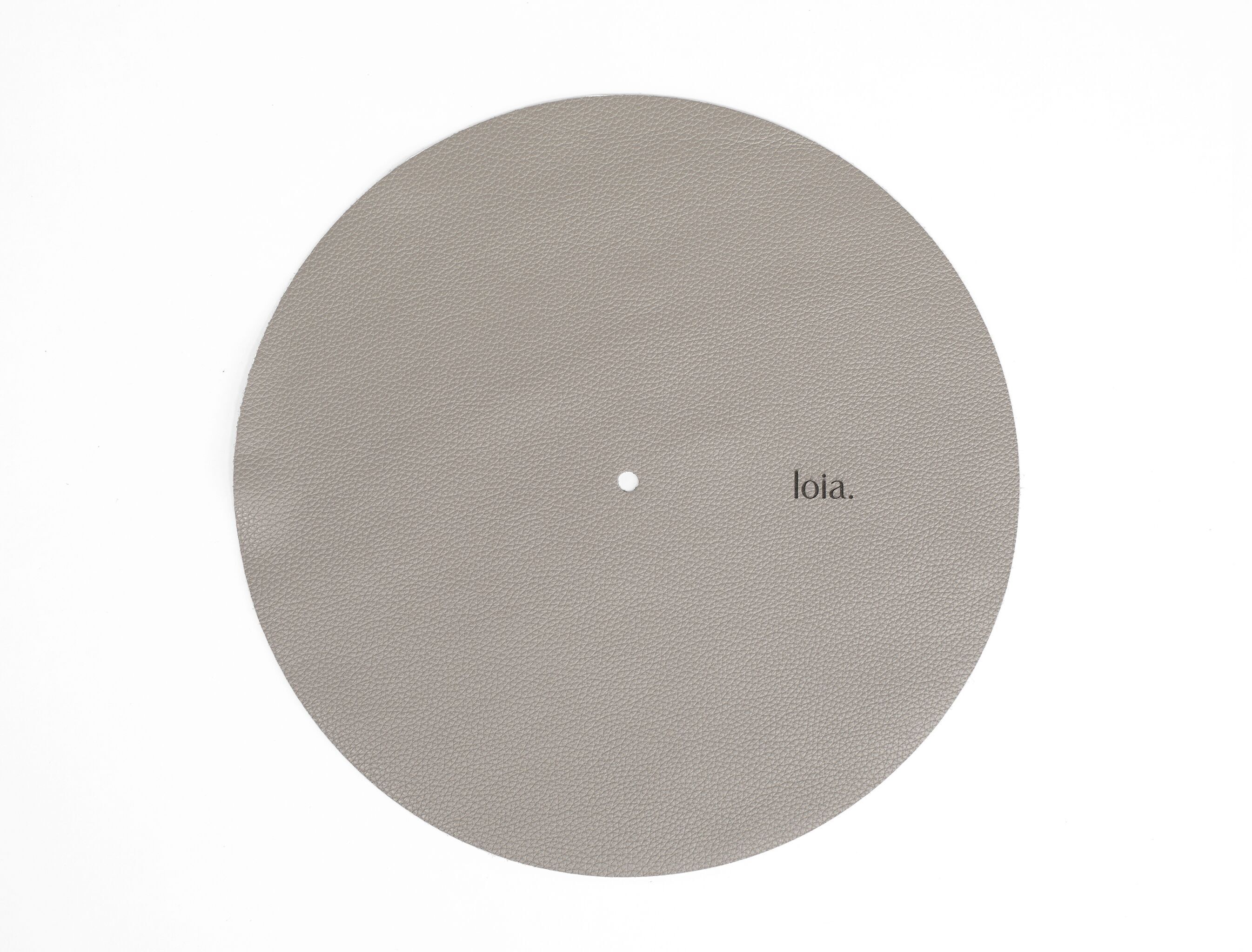 La copertura per piatto in pelle: accessorio essenziale per giradischi in vinile