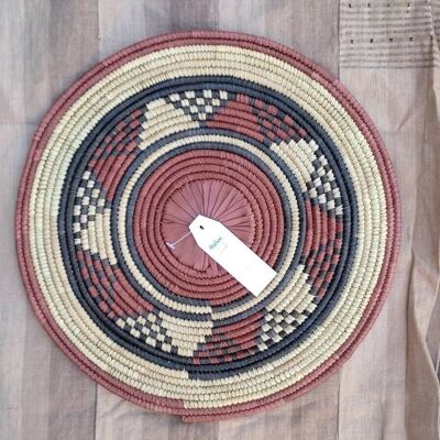 African wall basket in tinted straw for decoration or tableware