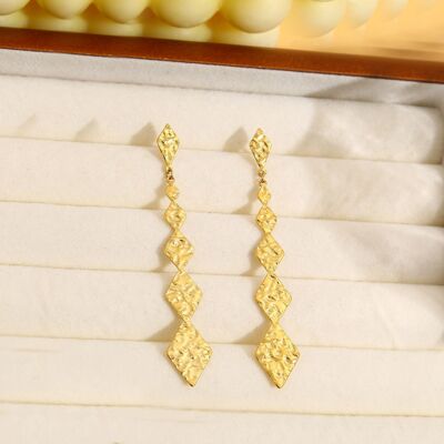 Gold earrings with diamond dangling line