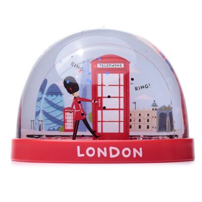 Cabina telefonica rossa souvenir di Londra e tempesta di neve con glitter medio della guardia
