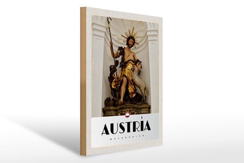 Holzschild Reise 30x40cm Österreich Skulptur Jesus Gold Schaf