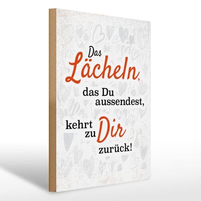 Holzschild Spruch 30x40cm Das lächeln das Du aussendest weiß