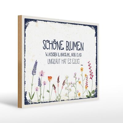 Wooden sign saying beautiful flowers grow slowly 40x30cm
