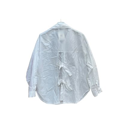 Plain cotton shirt open at the back with bows