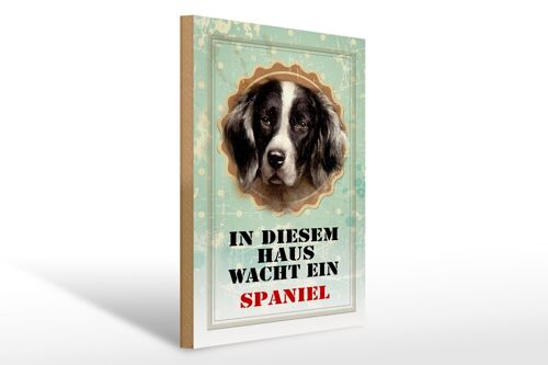 Holzschild Hund 30x40cm in diesem Haus wacht ein Spaniel