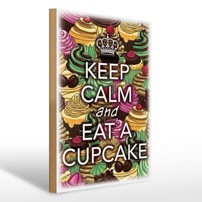 Cartello in legno con scritta 30x40 cm Mantieni la calma e mangia un cupcake