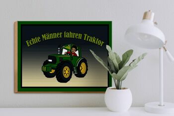 Panneau en bois indiquant 40x30cm de vrais hommes conduisent des tracteurs 3