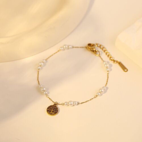 Bracelet doré en perles avec pendentif arbre de vie