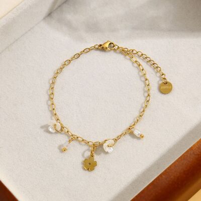 Golden chain bracelet with flower pendant