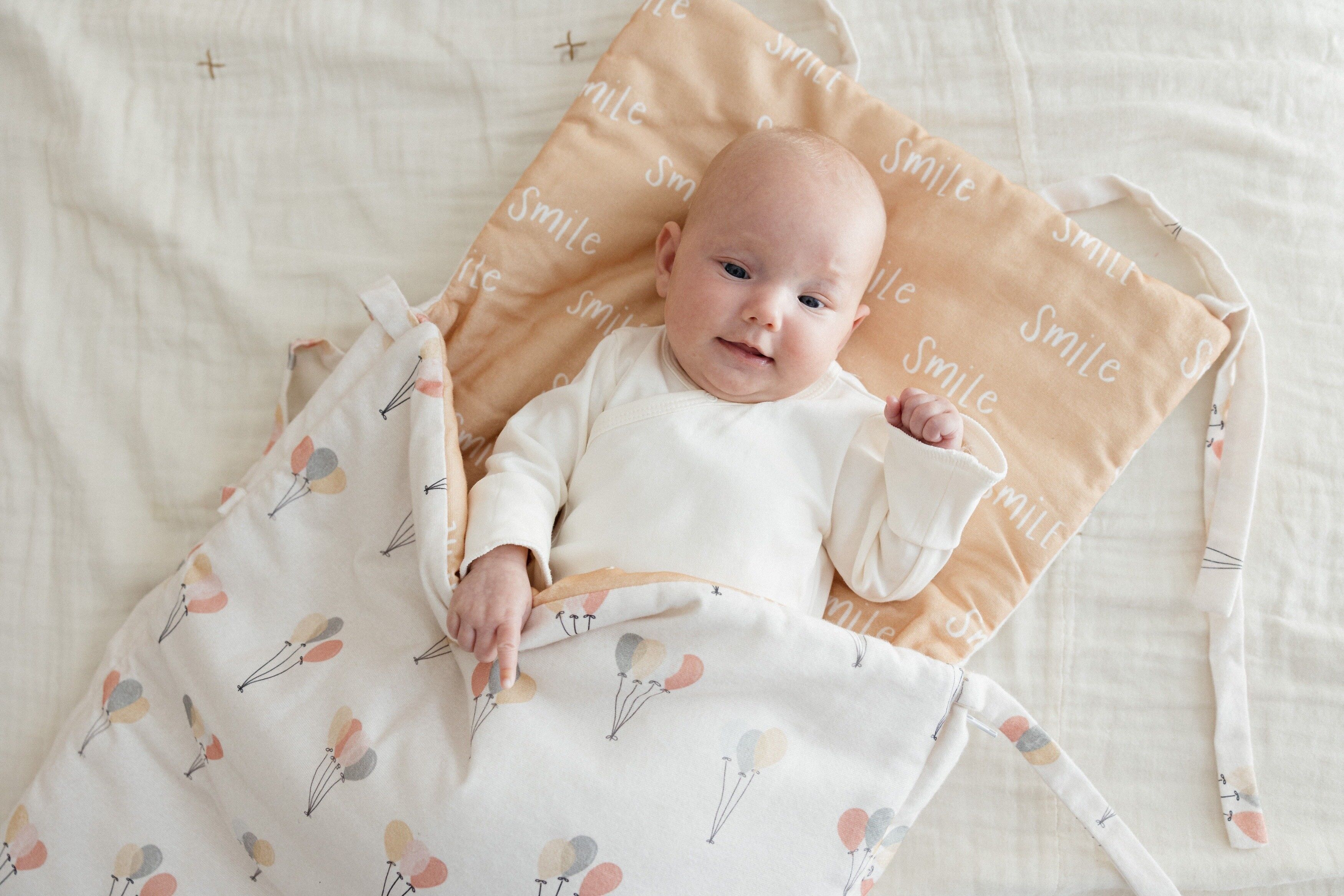 Doppelseitenschlafsack für Kinderwagen und Autositz BALOONS/SMILE