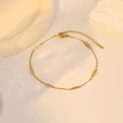 Gold anklet with mini leaf