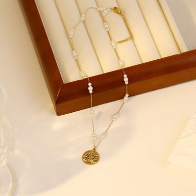 Collier en perles avec pendentif arbre de vie