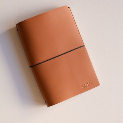 Leather notebook with interchangeable notebooks