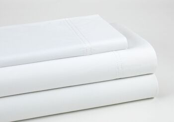 Ensemble de draps en coton biologique blanc. Finition double couture. Lit de 150 cm. 3 pièces 2