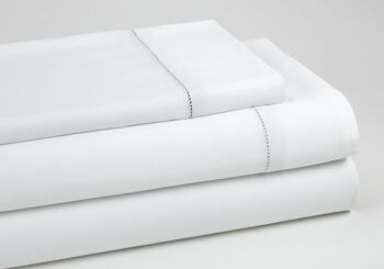 Ensemble de draps en coton biologique blanc. Finition ajourée. Lit de 180 cm. 4 pièces 2