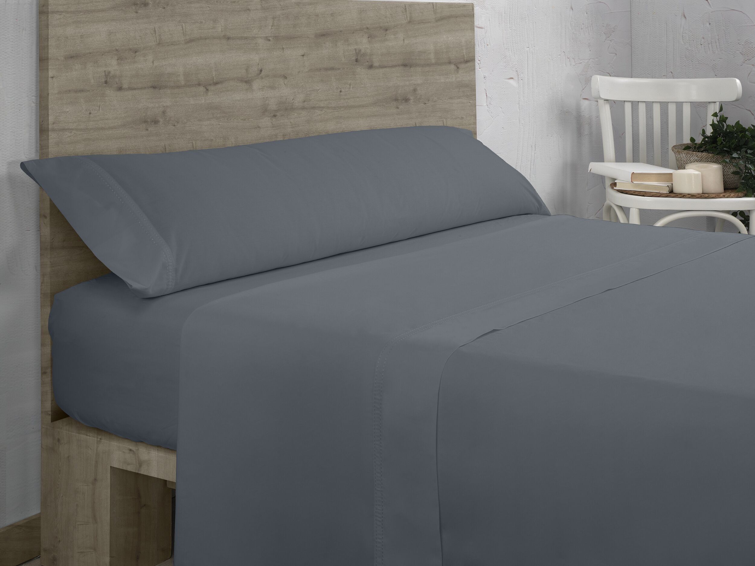 Completo lenzuola in cotone biologico Ash. Finitura con doppia cucitura. Letto da 105 centimetri. 3 pezzi