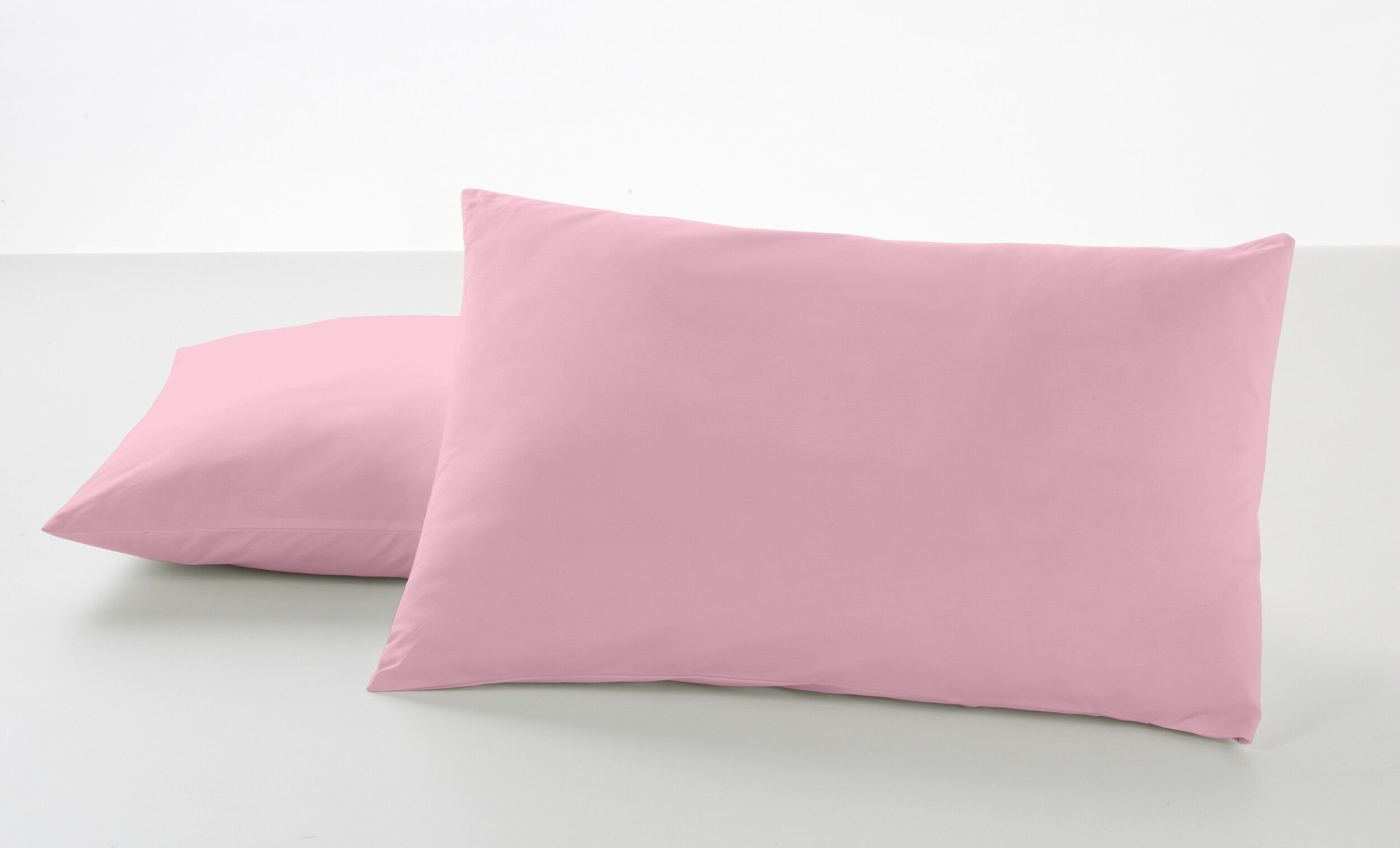 Pack de dos fundas de almohada color rosa - 50x80 cm - 50% algodón / 50% poliéster - 144 hilos - Cierre en tapa y solapa. Gramage: 115