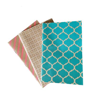 set of 3 notebooks with geometric patterns in bright colors