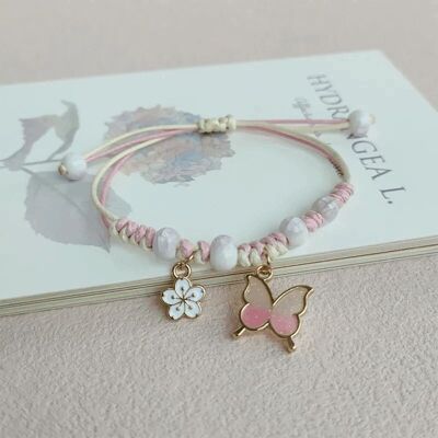 Verstellbares rosa Wunscharmband mit Schmetterling und Blume für Kinder / Freundschaftsarmband