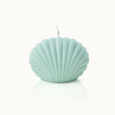 Large turquoise shell-shaped candle