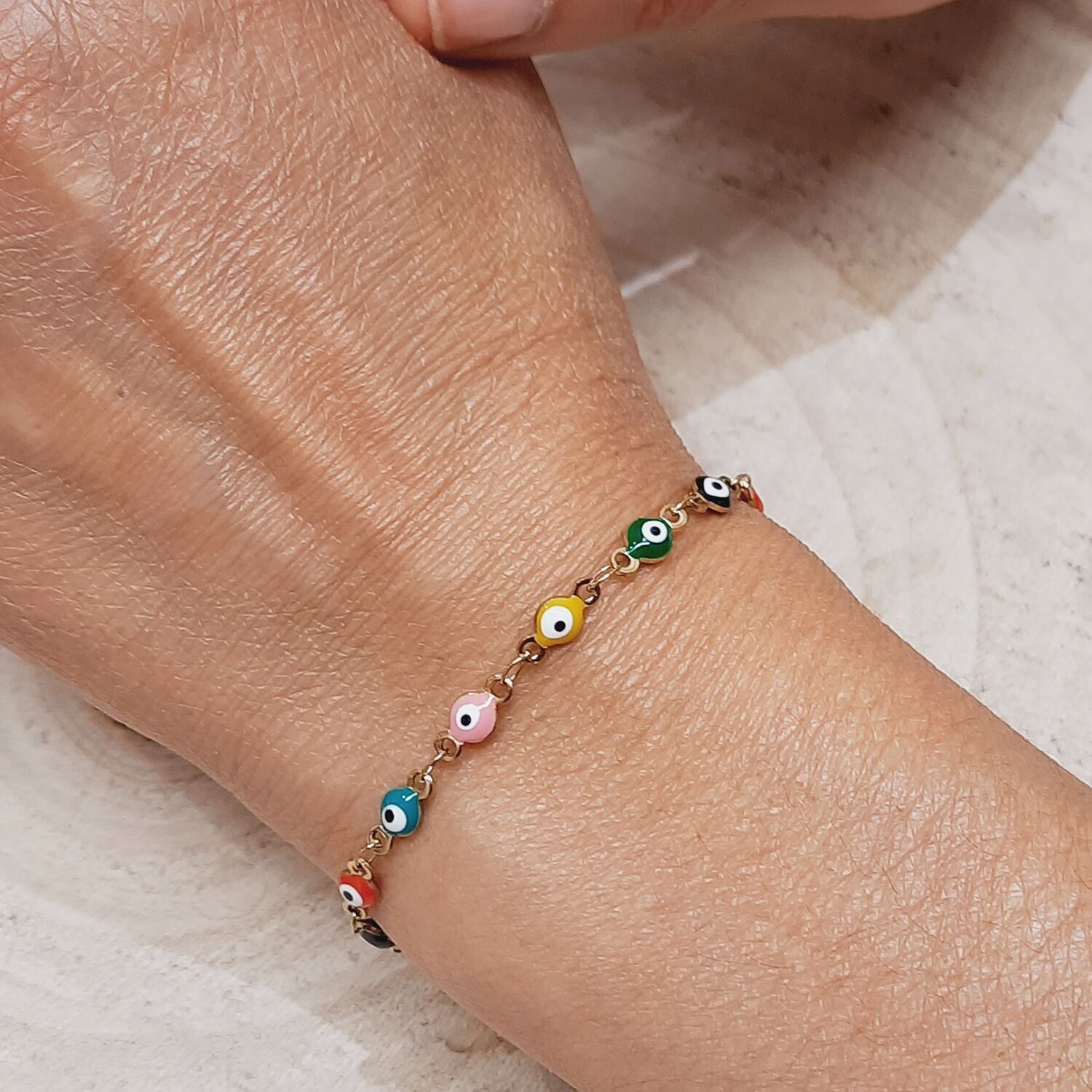 Bracciale protettivo multicolor per gli occhi