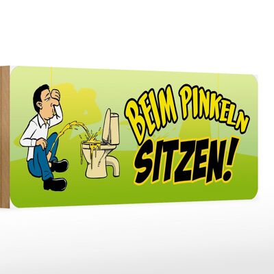 Holzschild Spruch 27x10cm Beim Pinkeln sitzen