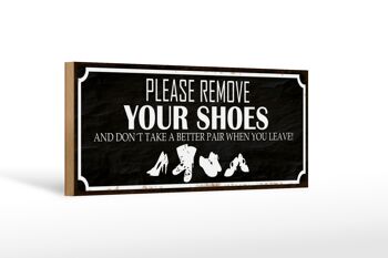 Panneau en bois indiquant 27x10cm, veuillez retirer vos chaussures, panneau noir 1