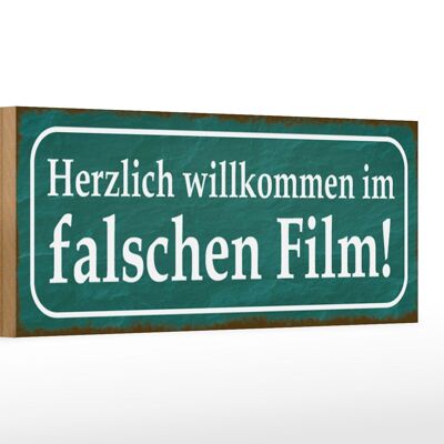 Cartel de madera que dice 27x10cm bienvenidos a la película.