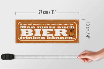 Panneau en bois indiquant que 27x10 cm n'est pas suffisant pour boire de la bière 4