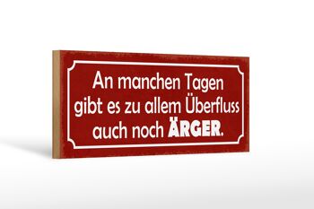 Panneau en bois indiquant 27x10 cm certains jours, il y a aussi des problèmes 1