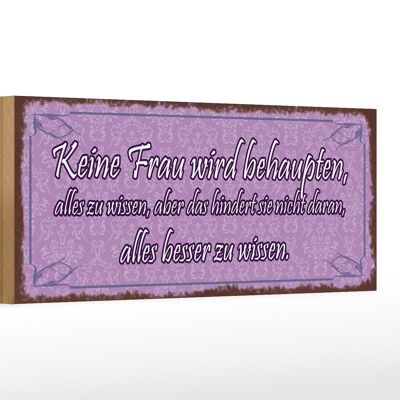 Cartello in legno 27x10 cm con scritta "nessuna donna pretende di sapere tutto".