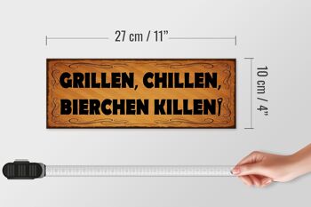 Panneau en bois indiquant 27x10cm, panneau orange pour griller, refroidir la bière, tuer 4