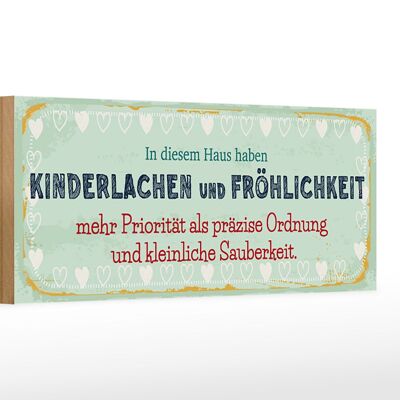 Cartel de madera que dice risa y felicidad infantil 27x10cm