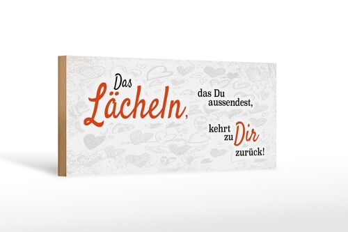 Holzschild Spruch das Lächeln kommt zurück 27x10cm