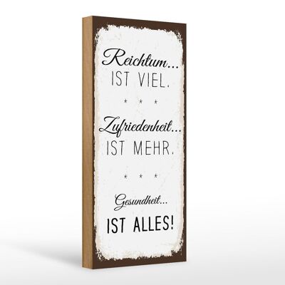 Holzschild Spruch Reichtum viel Zufriedenheit mehr 10x27cm