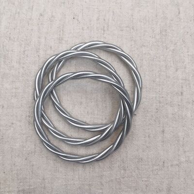 Marca oficial: pulsera budista retorcida de plata.