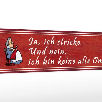 Cartello in legno con scritta 46x10 cm "Io lavoro a maglia non sono una vecchia decorazione della nonna".