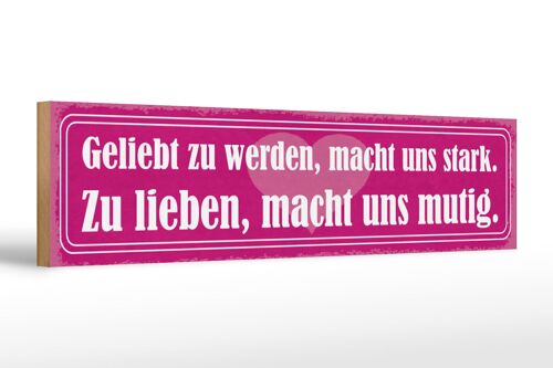 Holzschild Spruch 46x10cm Geliebt zu werden, macht uns stark