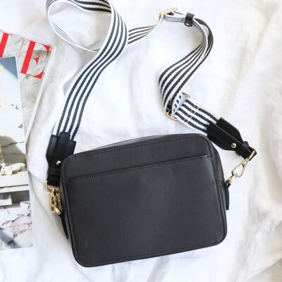 Zip Top Black Leather Bag with Open Front Pocket with webbing strap in black and white 5cm wide
