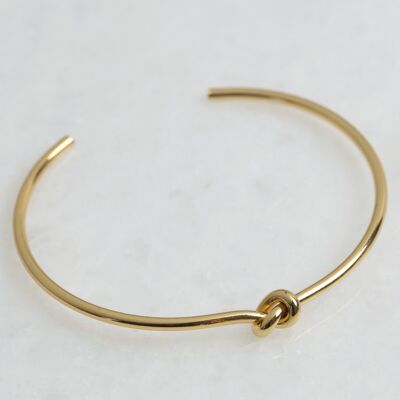 Shiny  gold plated brass thin knot bangle