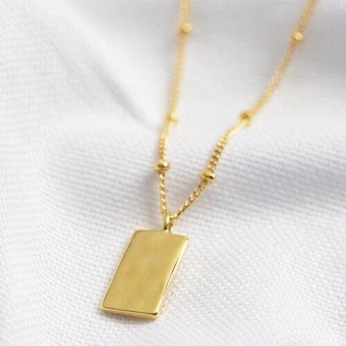 Tiny Hammered Tag Pendant Necklace in Gold