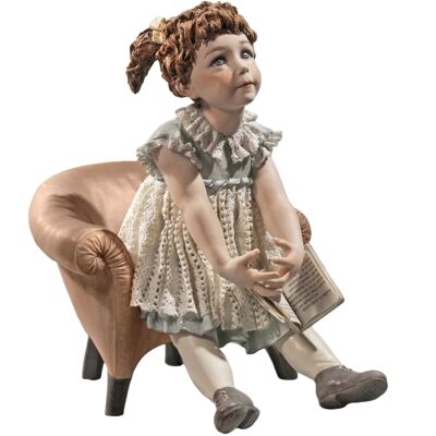 Porcelain figurine Emily on armchair