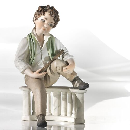 Statuina in porcellana Filippo , ragazzo con flauto