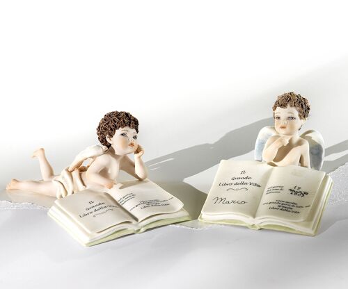 Statuine in porcellana di angeli con Libro della Vita