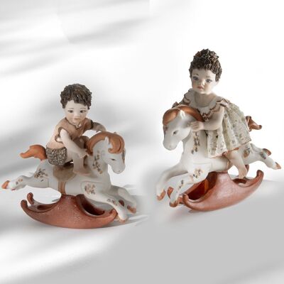 Statuine in porcellana di bimbi su Cavallini a dondolo - piccoli
