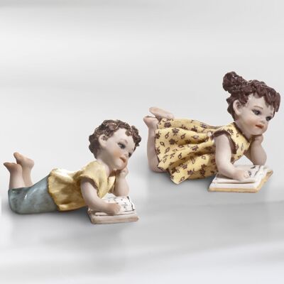 Figuras de porcelana de niños tumbados - Ada y Adán