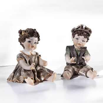 Figurine en porcelaine représentant un enfant assis portant des vêtements colorés - TinTin 4